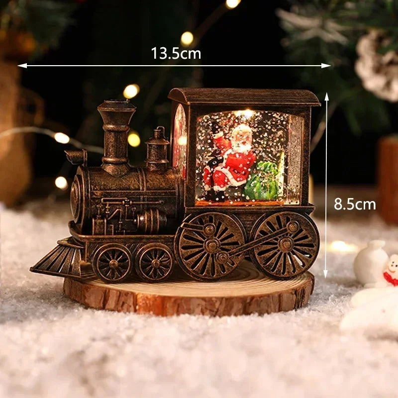 A rustic wooden Christmas train music box with LED lights and a water-filled crystal ball sits on a wooden surface.