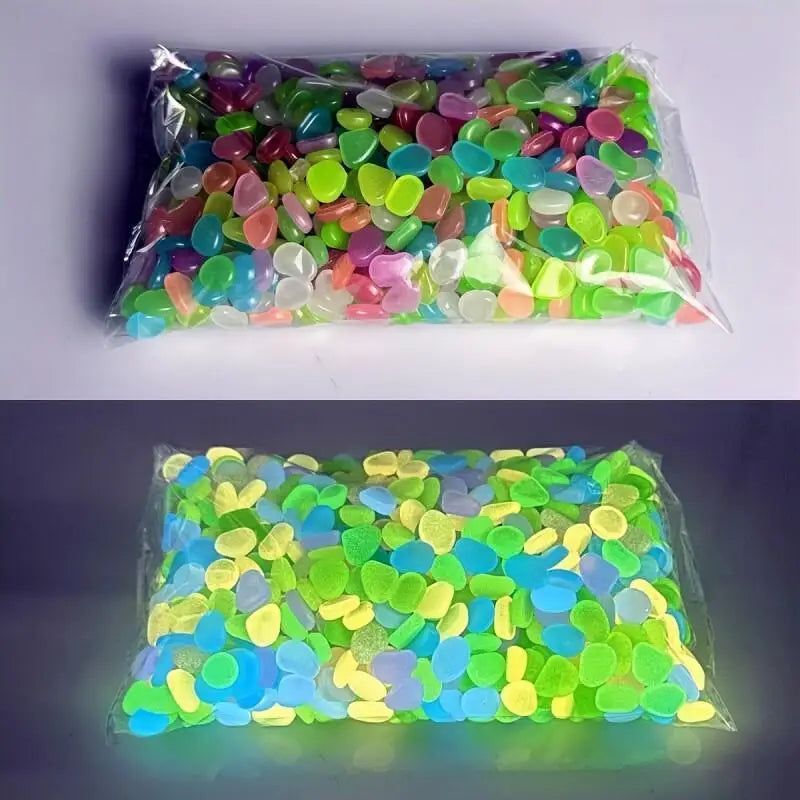 A clear plastic bag filled with brightly colored glow-in-the-dark luminous pebbles.