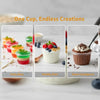 A display of various colorful desserts in clear disposable cups, including fruit toppings and chocolate mousse.