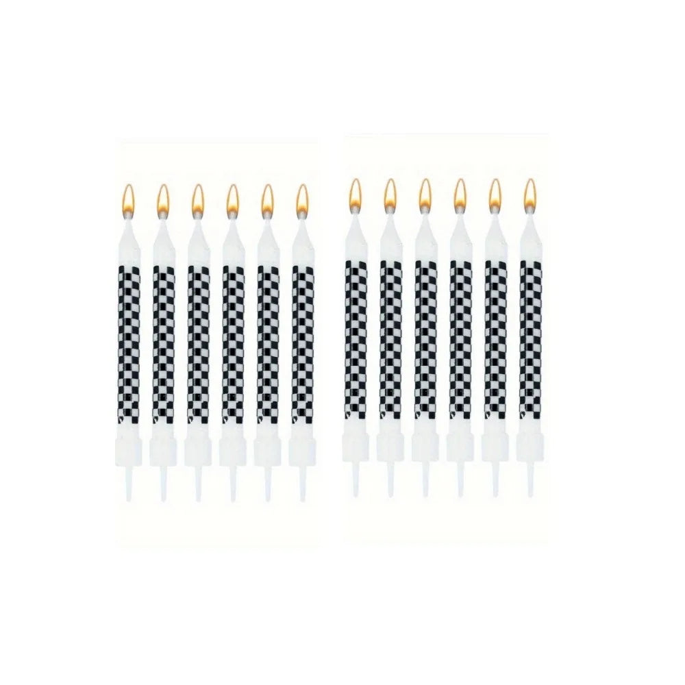 A row of spiral birthday cake candles with star toppers.