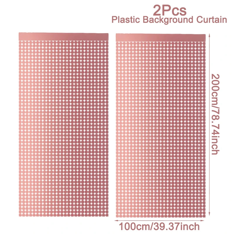 Two pink plastic background curtains measuring 200cm by 100cm for party backdrops