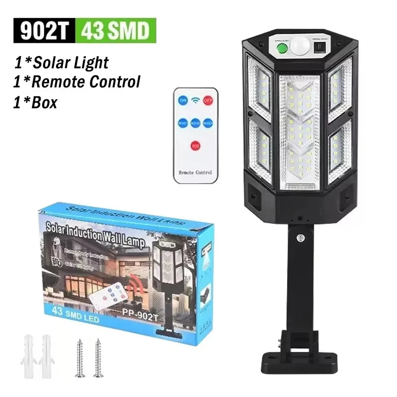 A solar-powered wall lamp security light with a remote control and box shown next to the product.