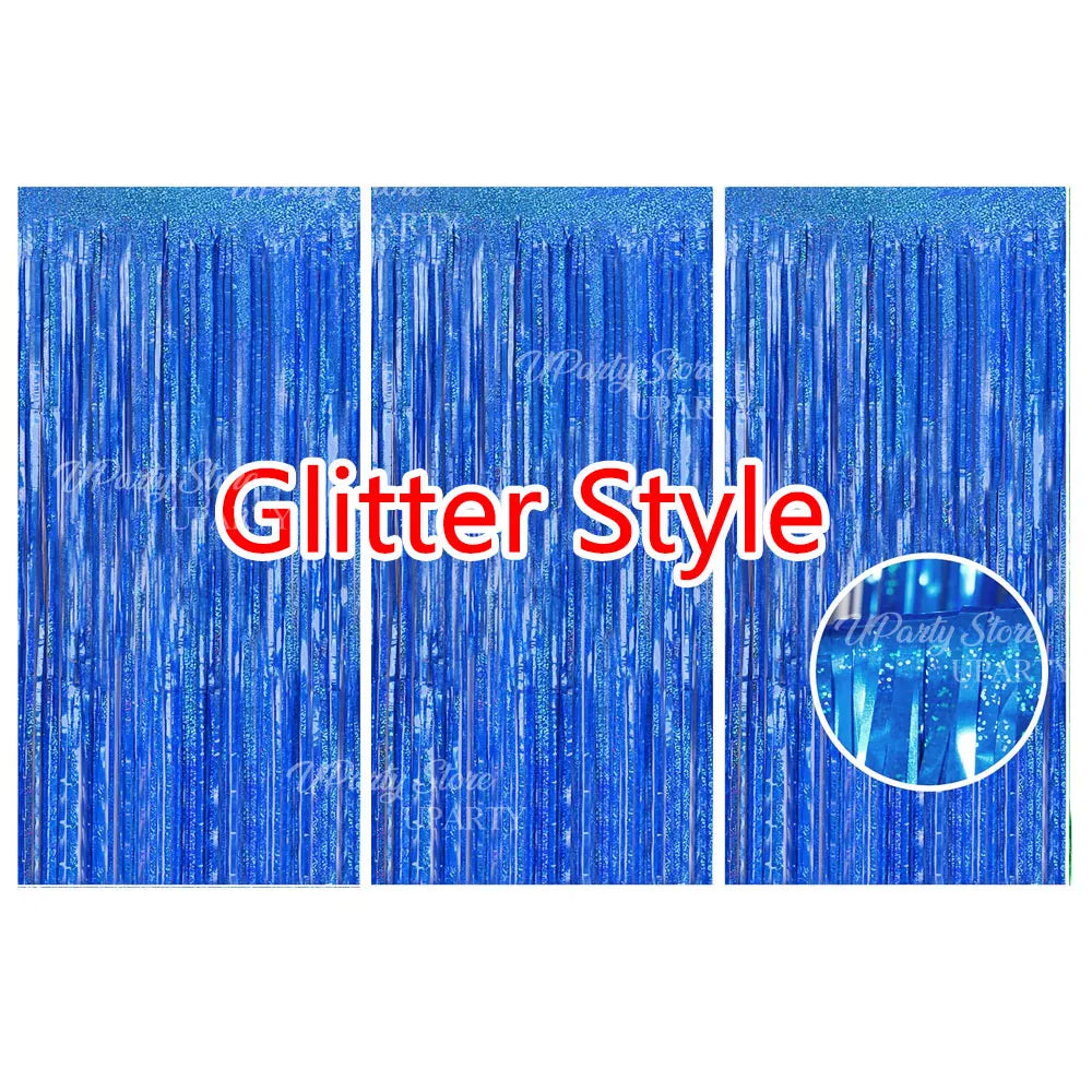Three vertical panels of blue glitter metallic foil fringe curtains for party backdrop decor