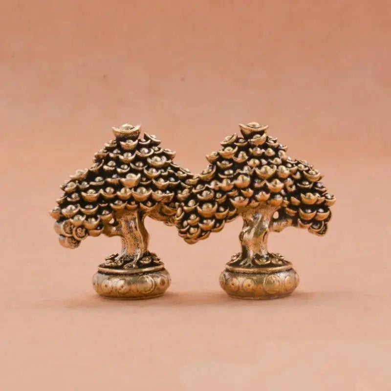Brass fortune tree ornament featuring two detailed trees with ingot accents.