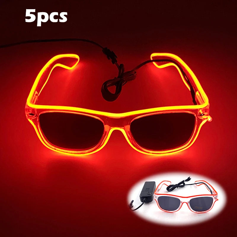 A pair of neon orange light up EL wire party glasses displayed against a red background.