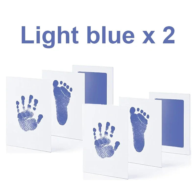Two light blue handprint and footprint cards for baby crafts