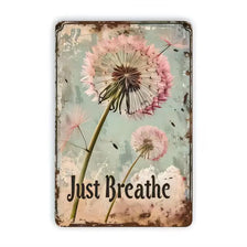 Vintage metal wall sign featuring a pink dandelion flower against a muted green background.