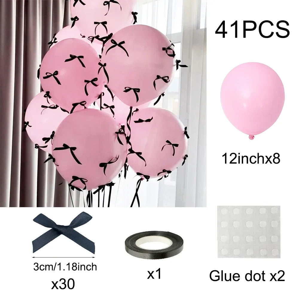 41 pieces of pink latex balloons with black bows and glue dots for decoration
