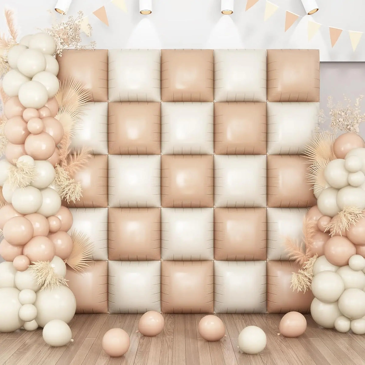 A display of square foil balloon wall panels in beige and white tones arranged in a grid.