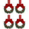 Set of four mini Christmas wreaths with red ribbon bows and red berries