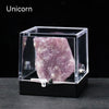 A rough, translucent purple crystal specimen is displayed inside a clear acrylic box.