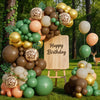 A balloon garland featuring earthy tones and giraffe print patterns, including gold, brown, and green balloons.