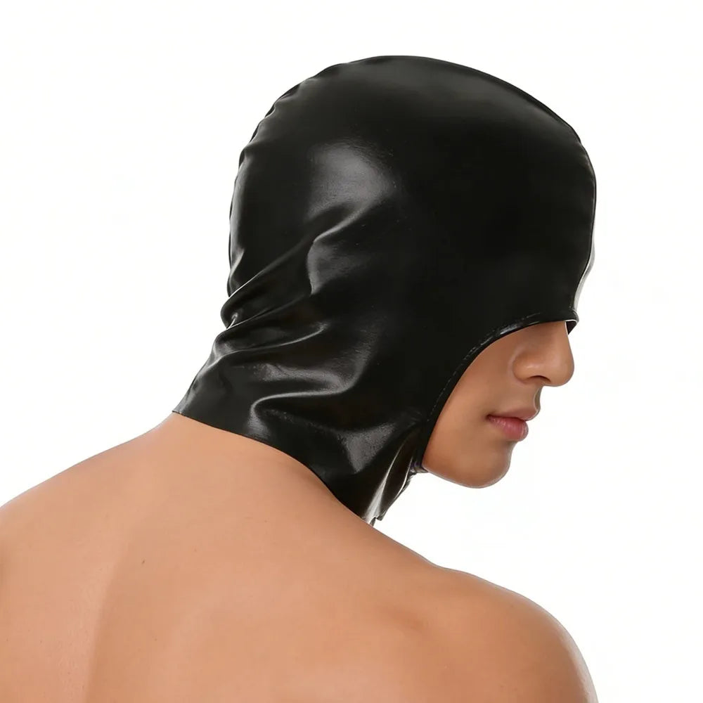 A black faux leather hood mask is shown on a person's face in a profile view.