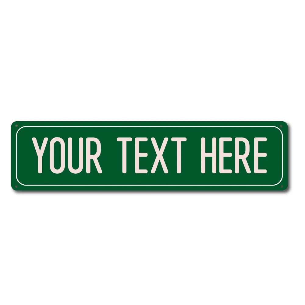 A rectangular green metal street sign with the text YOUR TEXT HERE.