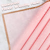 Pink waterproof flower wrapping paper with gold edges showing water droplets on the surface
