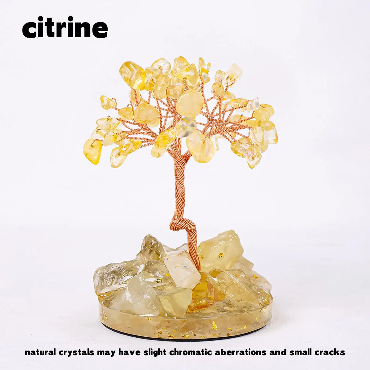 A natural crystal tree featuring yellow citrine crystals growing from a base.