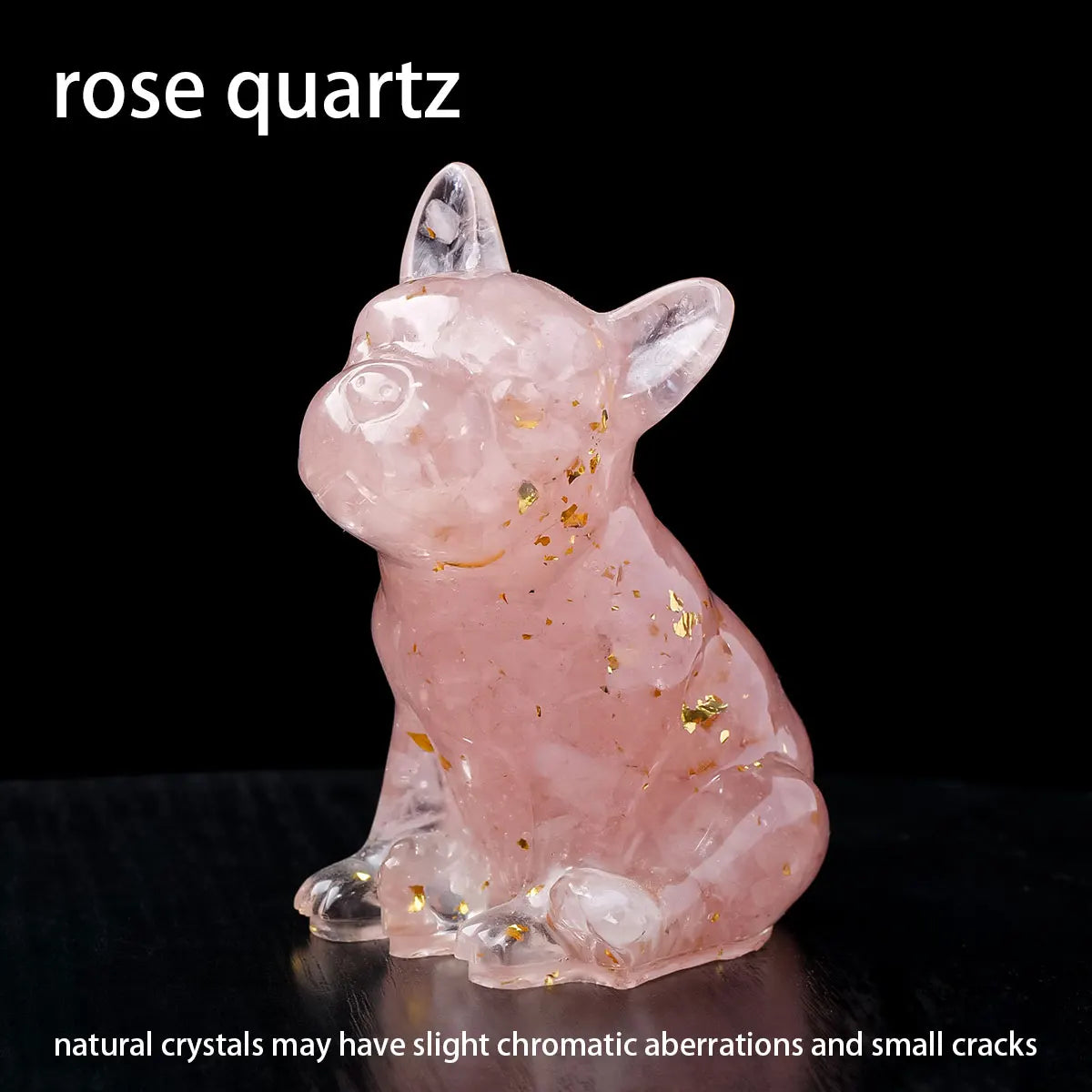 A pink rose quartz crystal statue shaped like a dog, featuring gold flecks.
