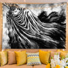 A black and white manga art tapestry featuring a dramatic figure in a cloak for bedroom decor.