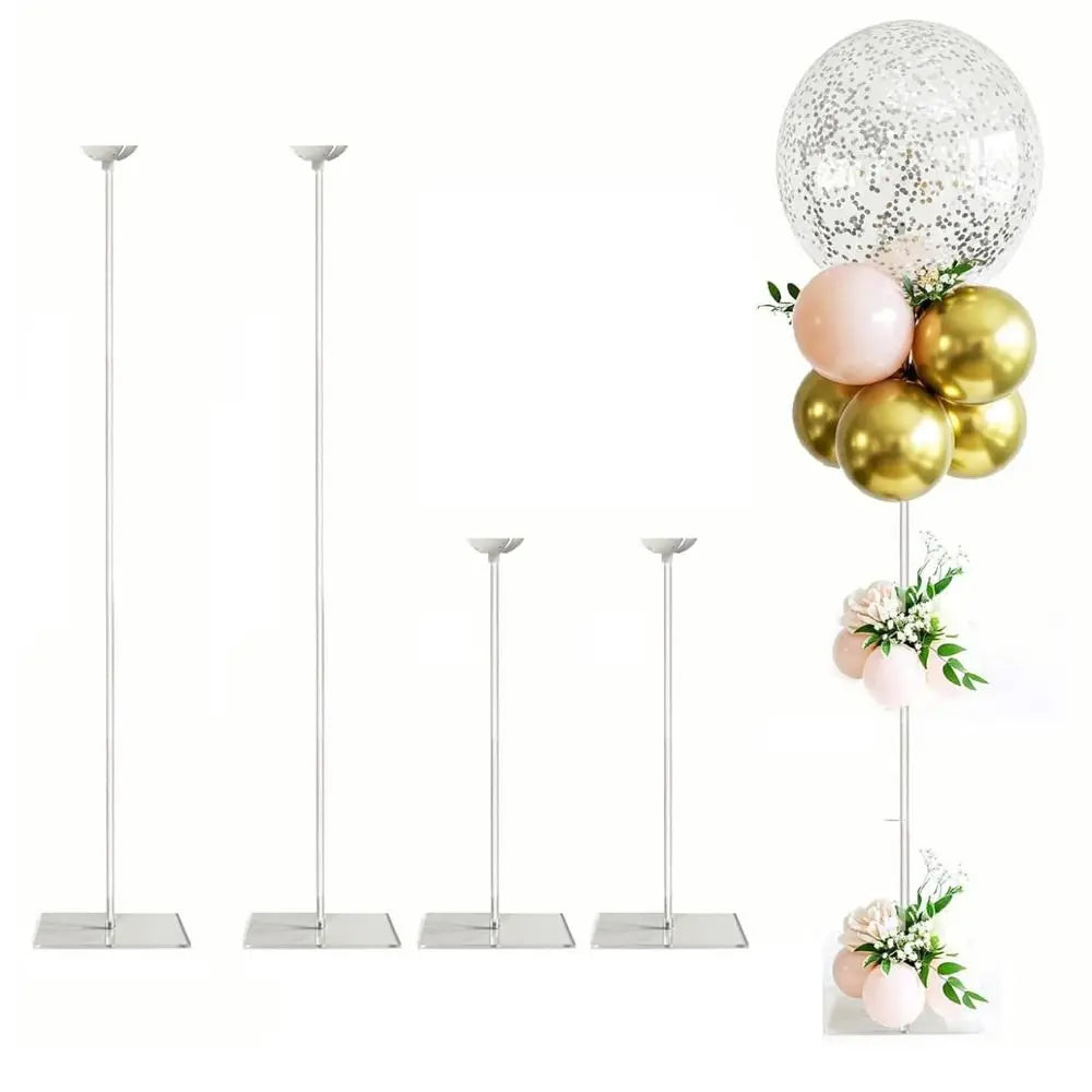 A set of silver acrylic balloon stands with gold and pink balloons.