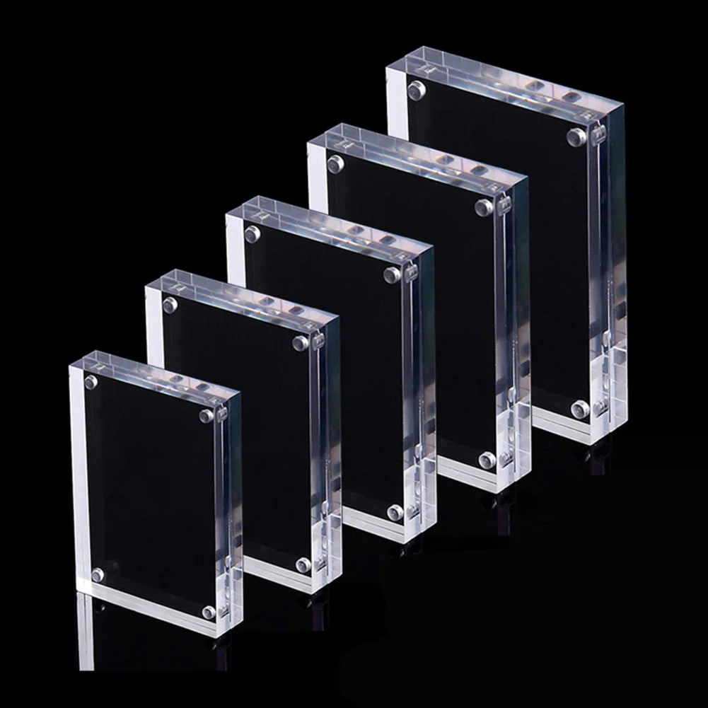 A set of five clear acrylic magnetic photo frames arranged in a diagonal line against a black background.