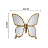 Artisan butterfly wall mirror featuring a gold antique frame and reflective surface.