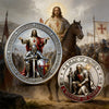 A challenge coin depicting Jesus Christ and a warrior of faith with a sword and shield.