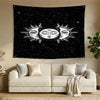 A dark banner featuring three stylized faces of the sun and moon surrounded by stars against a black night sky
