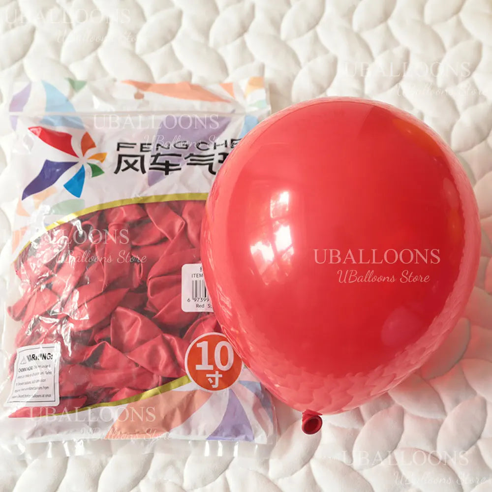 A red latex balloon garland kit package with 62 pieces of balloons is shown next to a large, inflated red balloon on a white 