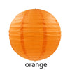 An orange decorative paper lantern, round in shape.