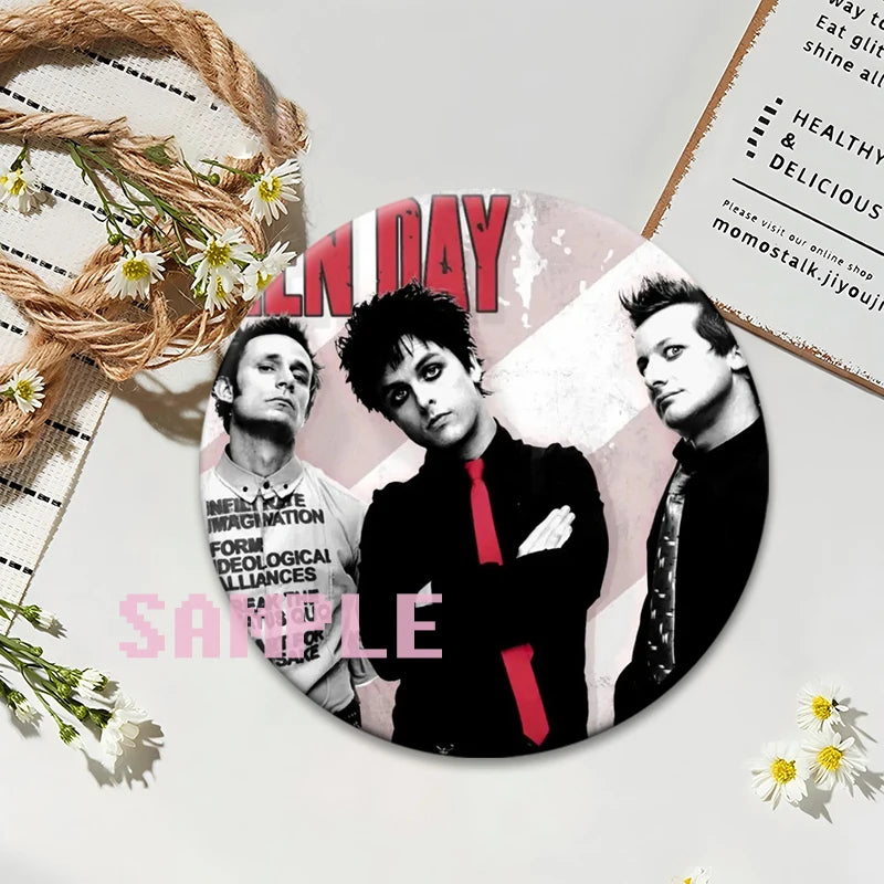 A set of collectible button pins featuring portraits of punk band members on an album cover design.