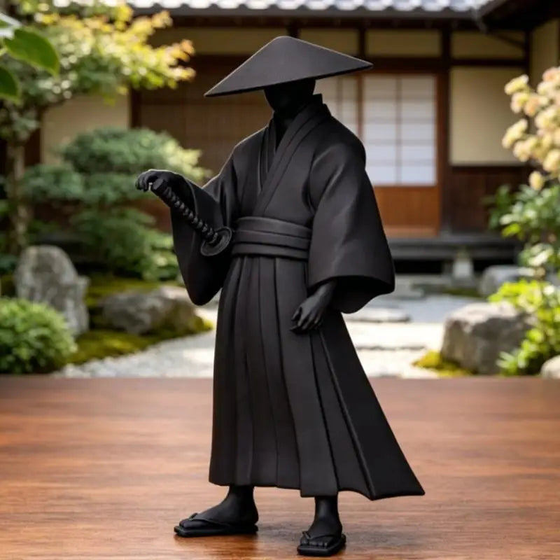A black resin statue of a female Grim Reaper wearing traditional Japanese attire and holding a scythe.