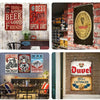 A collection of retro bar metal signs featuring text like Best Beer is an Open One and Duvel.