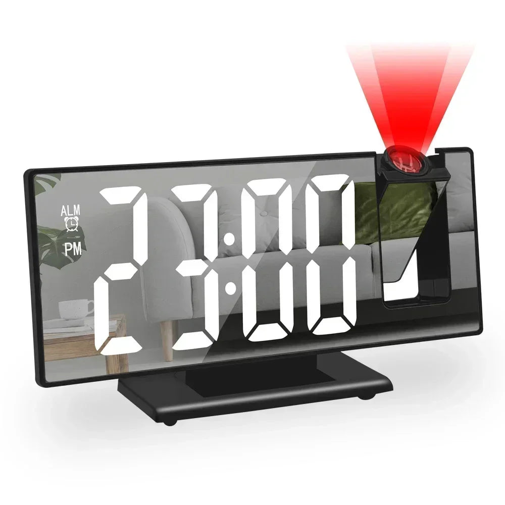 A digital projection alarm clock displaying 23:00 and 3:00 with a red light beam.