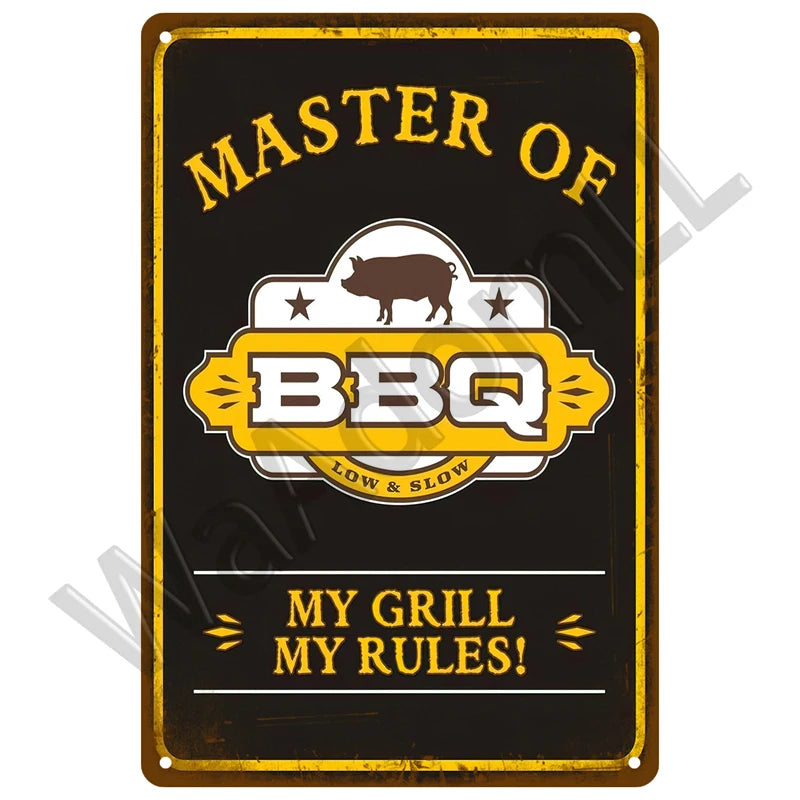 A vintage-style metal sign with the text MASTER OF BBQ LOW & SLOW and MY GRILL MY RULES!