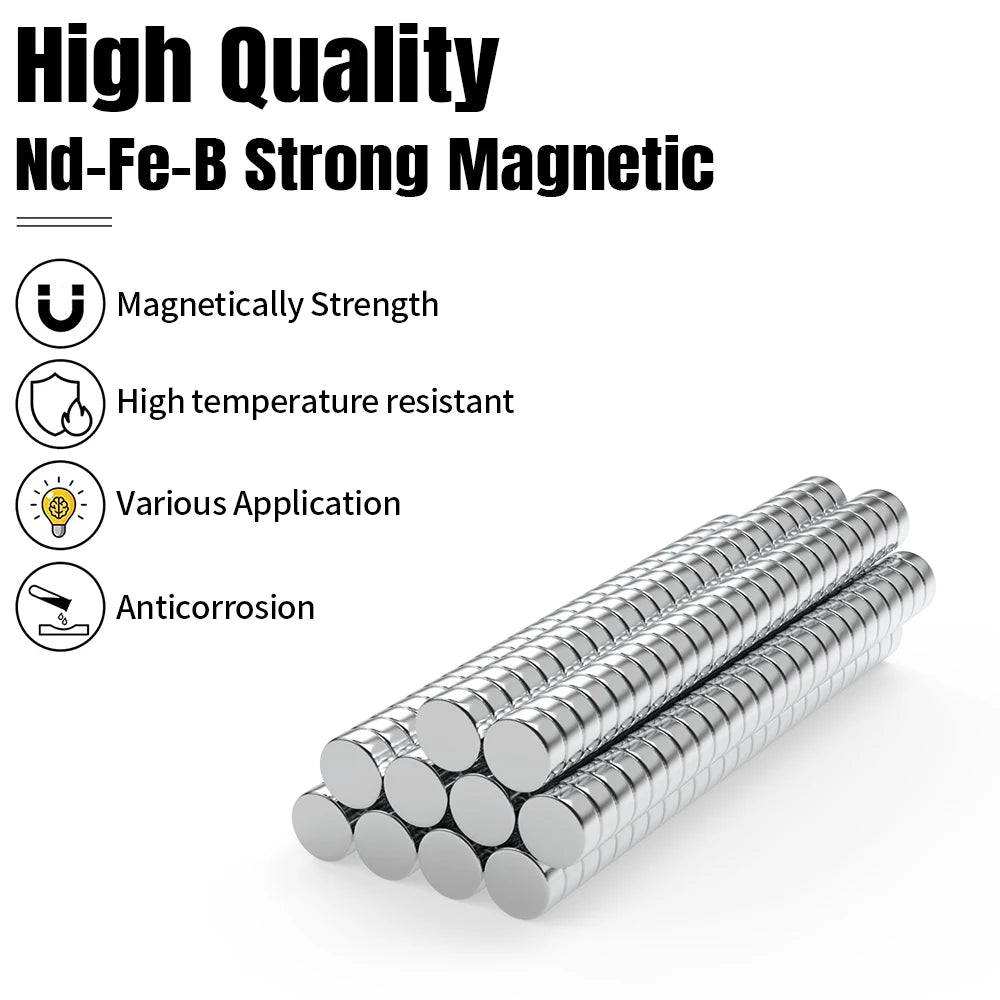 A close-up view of several silver round magnets arranged in a row.