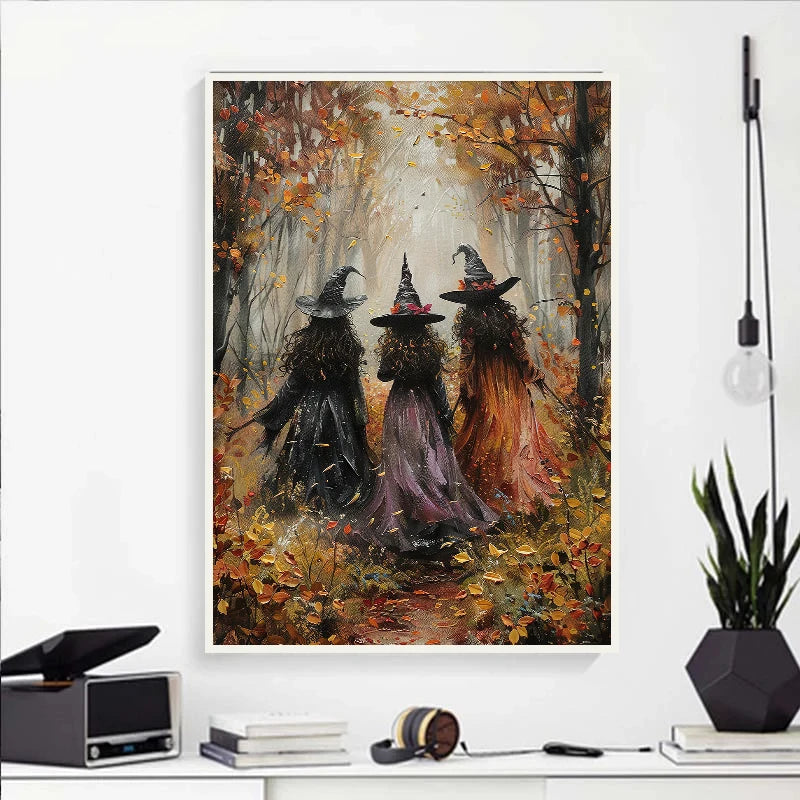 Canvas wall art depicting three dark witches in flowing robes amidst autumn foliage and a forest setting.