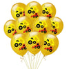 A bunch of yellow latex balloons shaped like construction tractors and excavators.