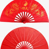 Red traditional bamboo folding fan with gold dragon designs for martial arts and fitness