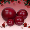 A collection of deep burgundy latex balloons in various sizes, including 5 inch, 10 inch, and 12 inch, displayed against a pi