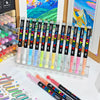 A collection of 36 color acrylic marker pens arranged in a display box.