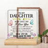 A personalized acrylic desk sign with a floral design and text saying I love you to my daughter