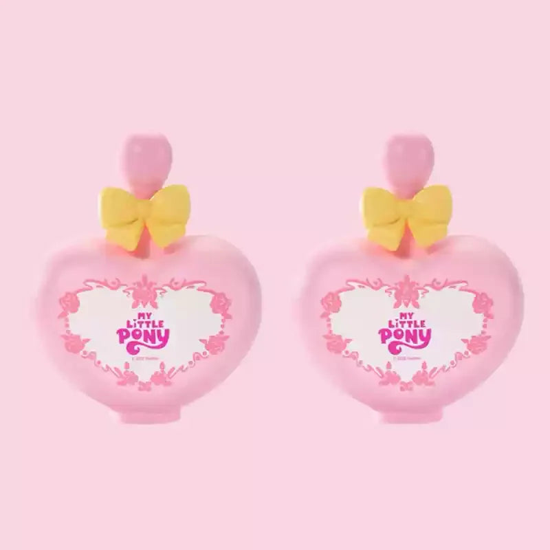 A pair of pink My Little Pony Magic Bottle collectible figurines with yellow bows.