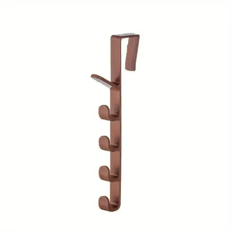 A vertical set of brown over-the-door hooks for bags, hats, and scarves.