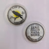 A challenge coin featuring a silhouette of a bird and text including the phrase Last Fuck