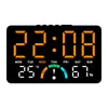 A digital alarm clock displaying the time 22:08, temperature 25°C, and humidity 67%.