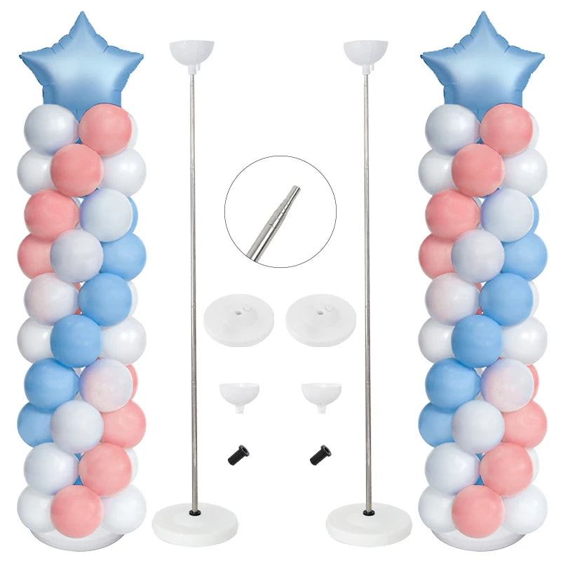 A set of adjustable metal balloon column stands with blue and pink balloons.