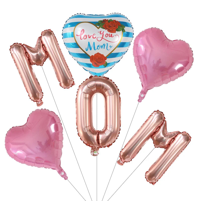 A set of six pink and rose gold foil balloons, including a heart shape, a number zero, and elongated letters.