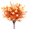 A bouquet of artificial fall eucalyptus and flower stems featuring vibrant orange and yellow hues for outdoor decor.