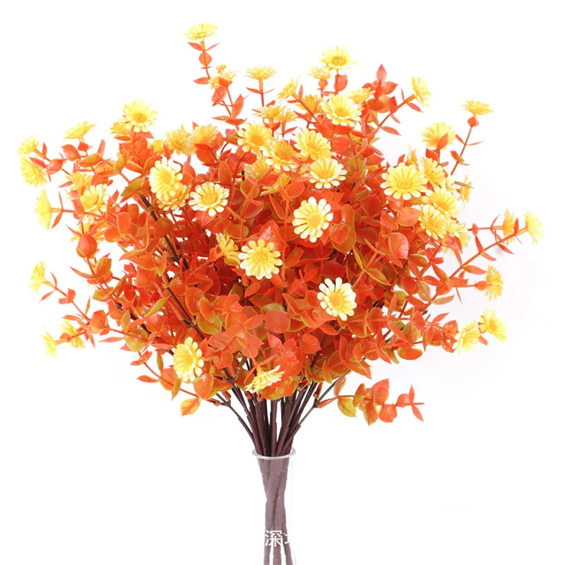 A bouquet of artificial fall eucalyptus and flower stems featuring vibrant orange and yellow hues for outdoor decor.