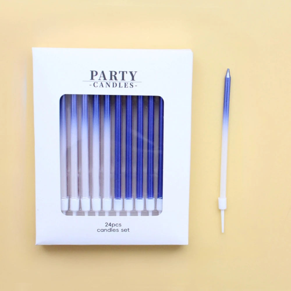 A set of 24 blue candles packaged in a white box labeled Party Candles